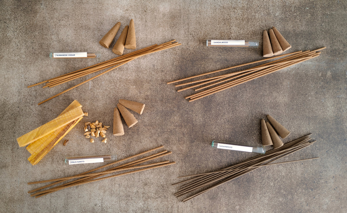 Palo Santo, Sandalwood, Agarwood and Taiwanese Cedar incense sticks and cones with raw Palo Santo wood